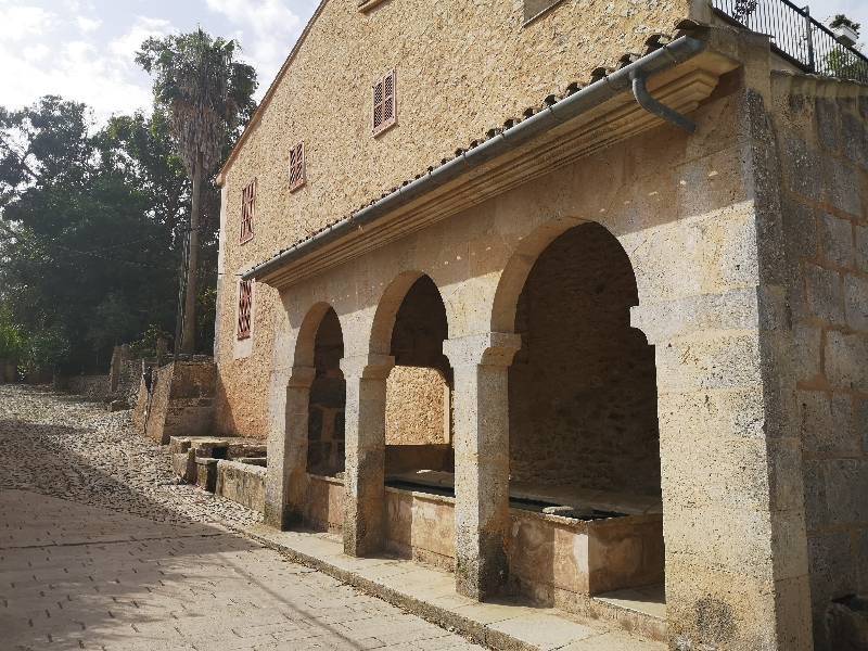 Water bassin under a porch at a Moorish qanat in Randa village, Mallorca.