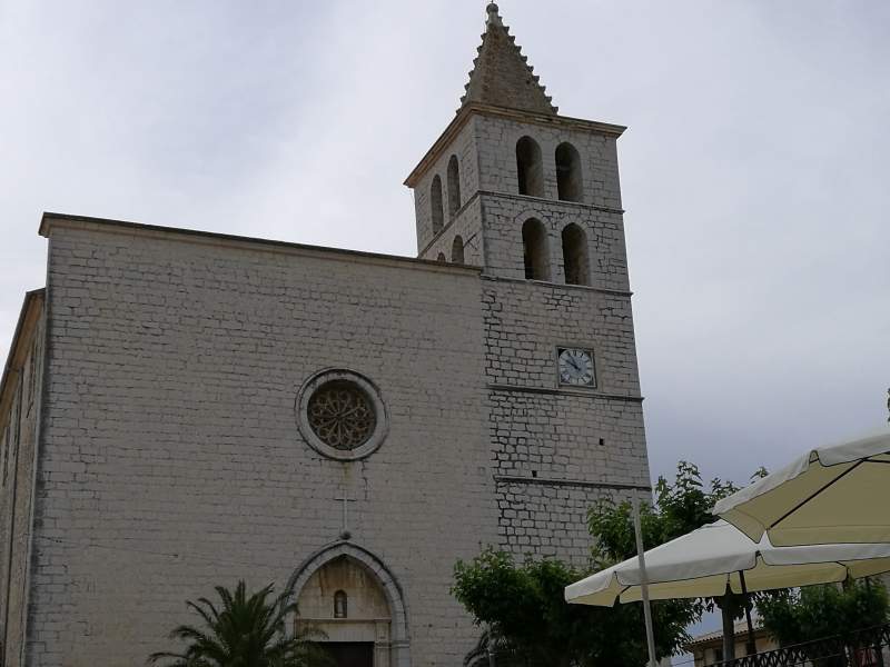 Front facade of church of Sant Miquel in Campanet village center, Mallorca.