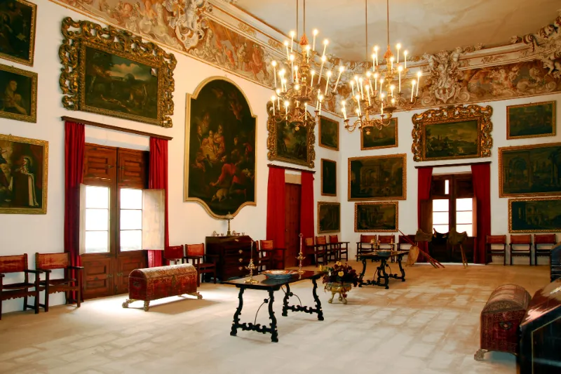 Hall inside the Can Vivot mansion in Palma, Mallorca, decorated with baroque paintings on the walls.  