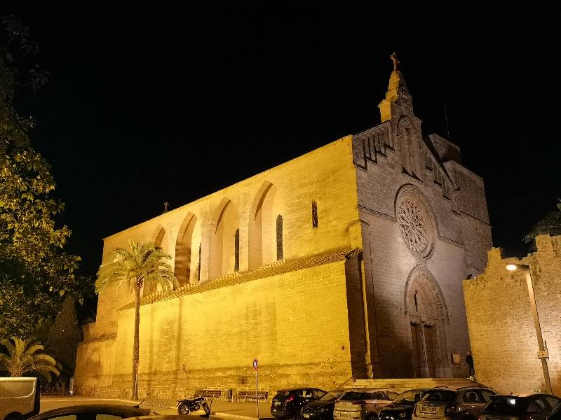 Sant Jaume church in Alcudia, Mallorca illuminated at night.