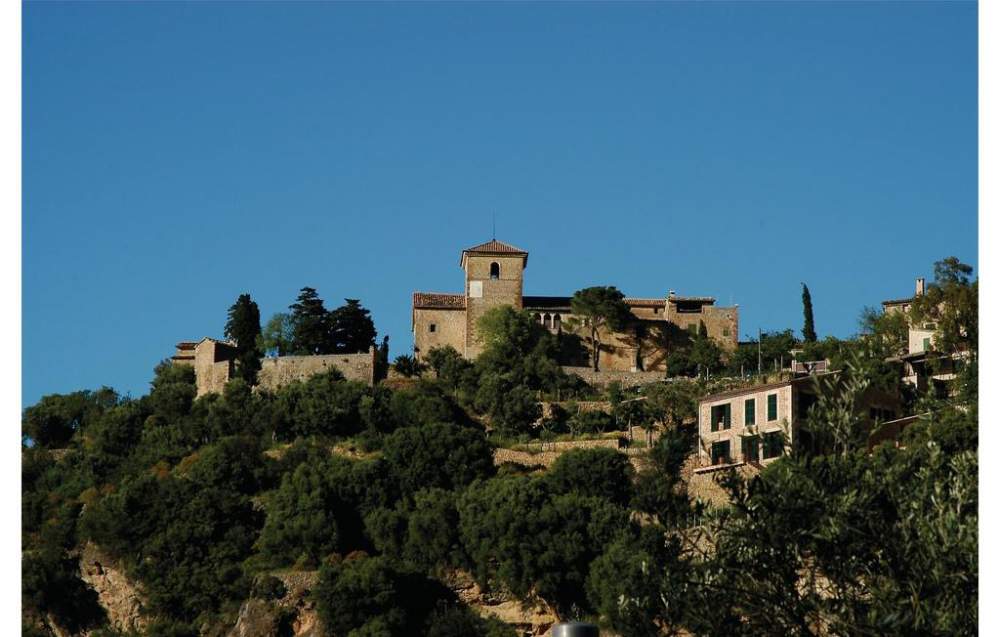 Hilltop parish church of Sant Joan Baptista in Deia village, Mallorca.