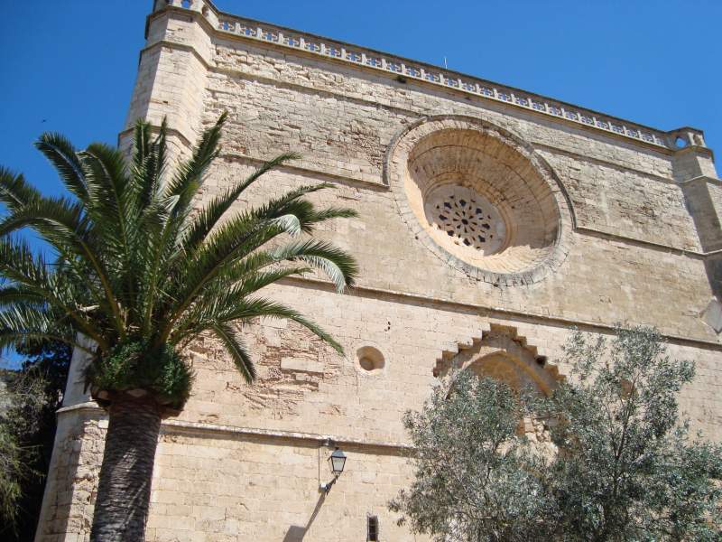 Main facade of the Sant Pere church in Petra, Mallorca, with beautiful rosette.