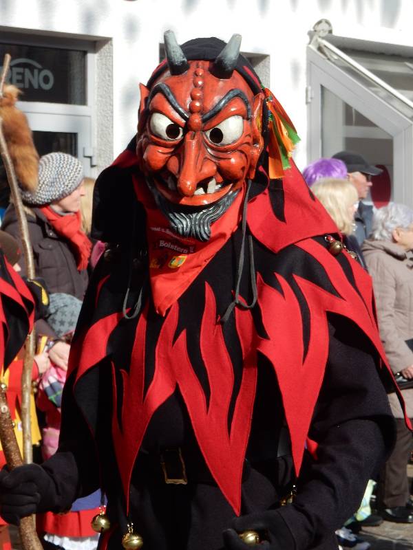 person dressed up as demon during a traditional festivity in mallorca