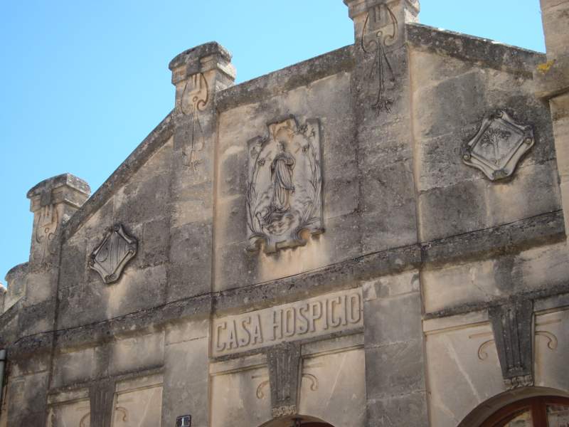Facade with religious reliefs on the chapel of Saint Joseph in Sineu town, Mallorca
