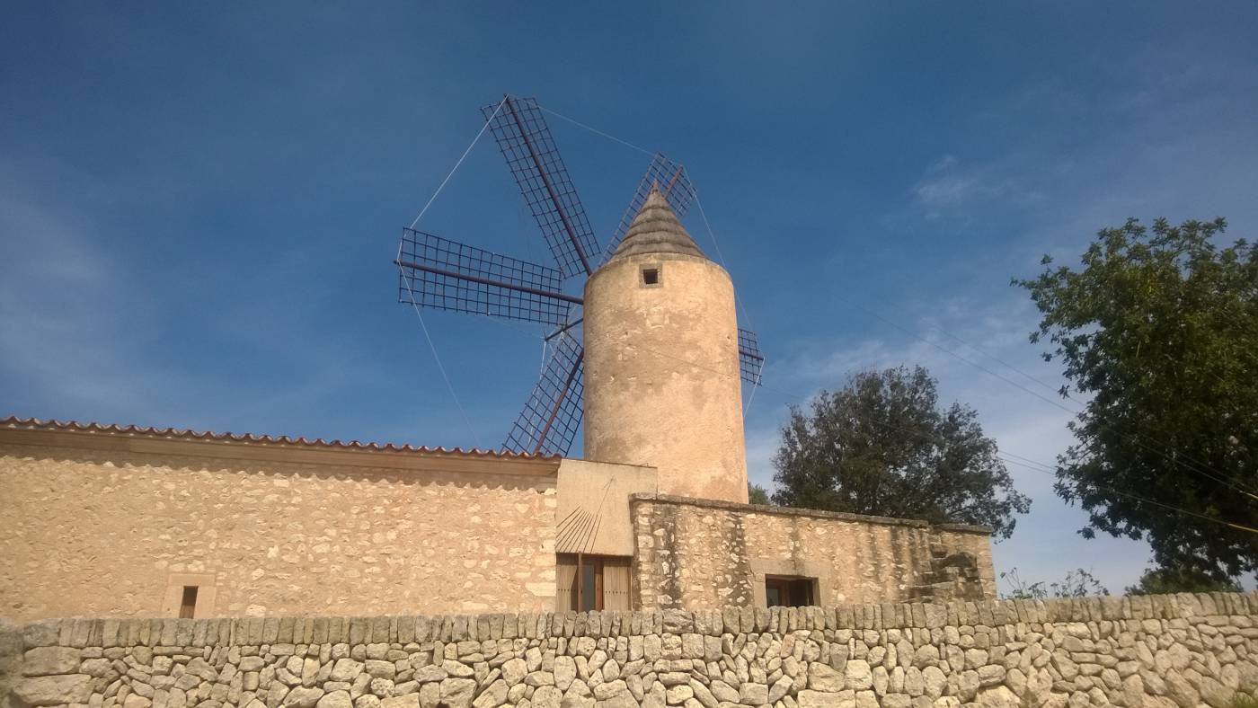 Old windmill of Moli d'en Fraret and current archaeological museum of Son Fornes, in Montuïri village, Mallorca.