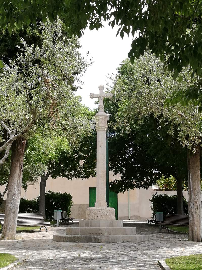 Old windmill and stone cross of Son Rafal in Llubi village, Mallorca.