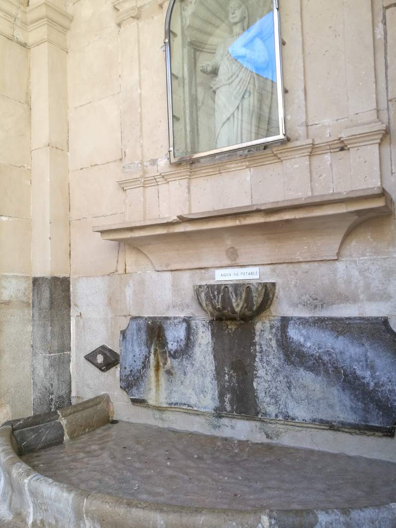 Sacredwater fountain at the square of Placa de sa Font de Santa Margalida in Felanitx town, Mallorca.