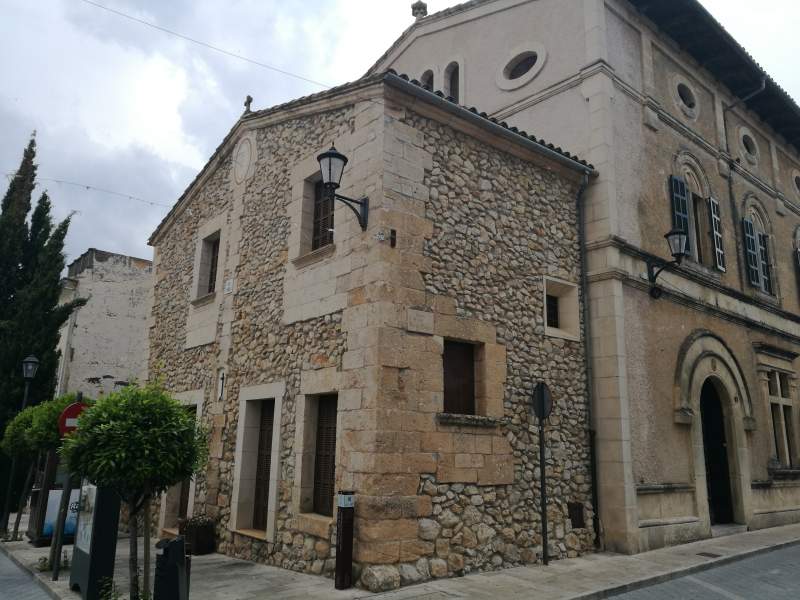 Facade with Regionalism architecture on the rectory building in Sant Llorenc des Cardassar village in Mallorca, Spain.