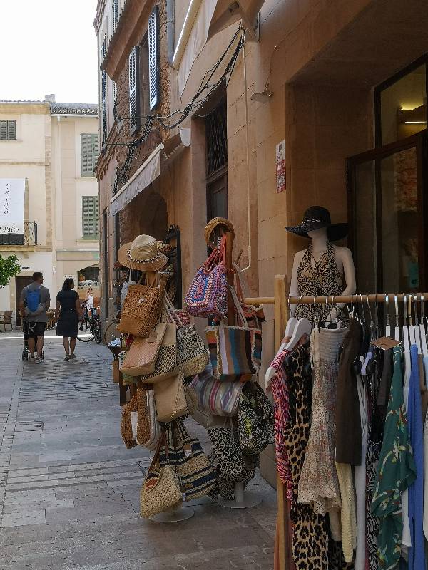 Clothing store in a small street in Alcudia old town, Mallorca.