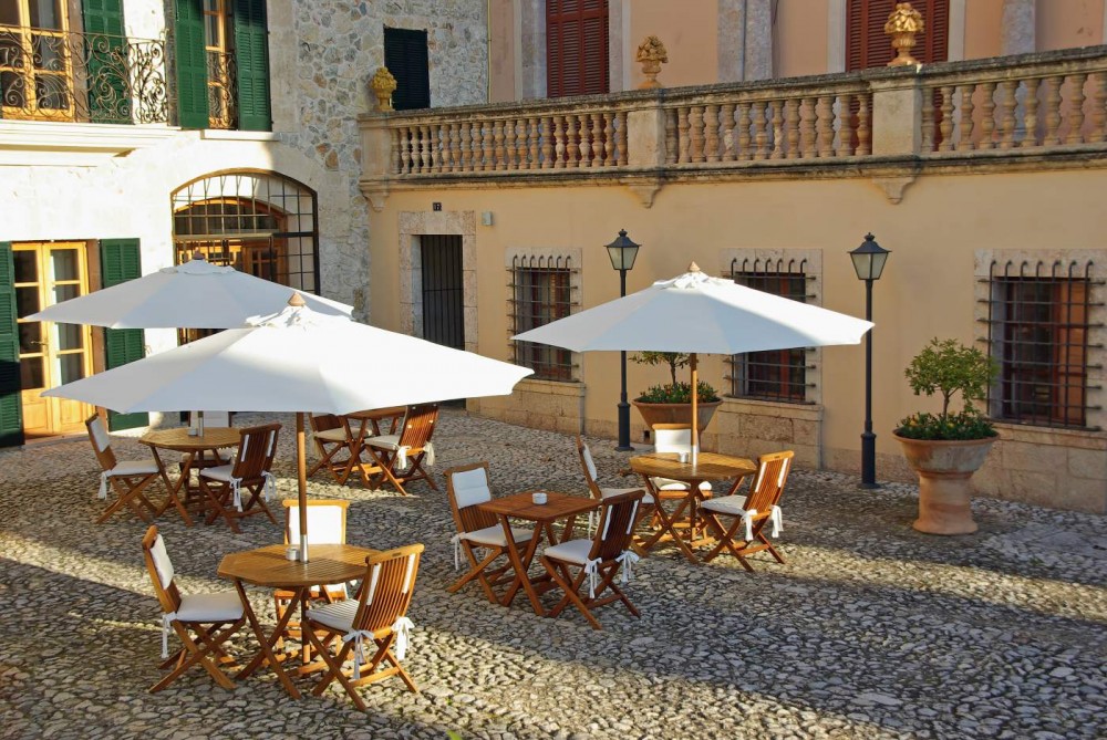 Cozy terrace at a hotel in Lloseta village, Mallorca, Spain.