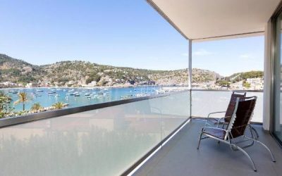 Balcony with sea views at Hotel Aimia in picturesque port de Sóller, Mallorca.