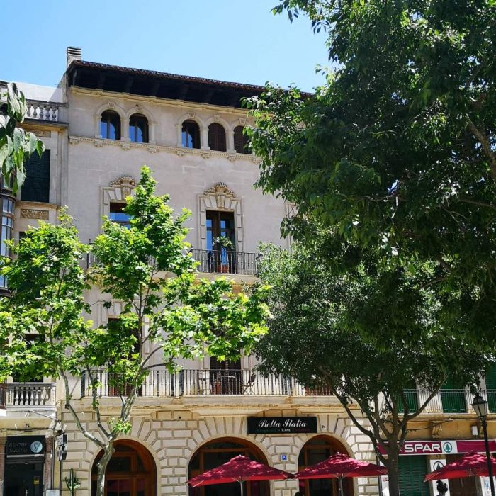 building facade of the house known as 'Bar Tabu' with a mix of Regionalism and Classicism architecture in llucmajor town, Mallorca island.