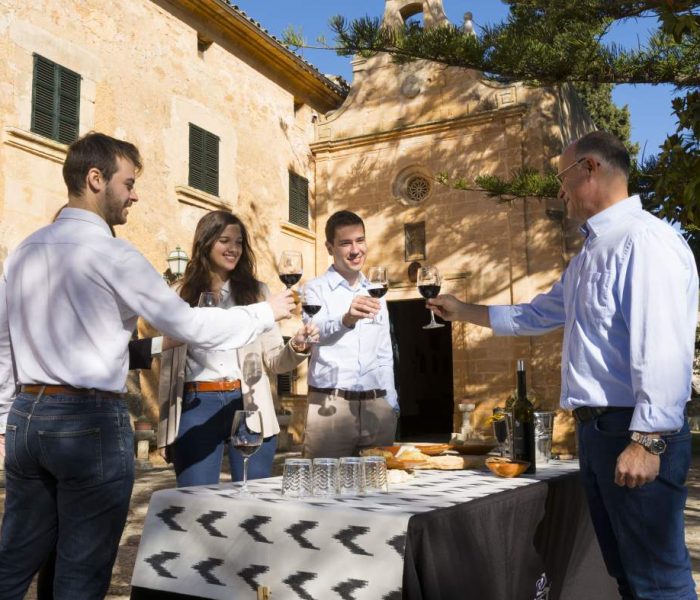 group doing wine tasting at winery Bodega Son Sureda Ric in Manacor, Mallorca.