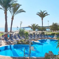 cala-millor-mallorca-hotel-beachfront-pool-summer-palms