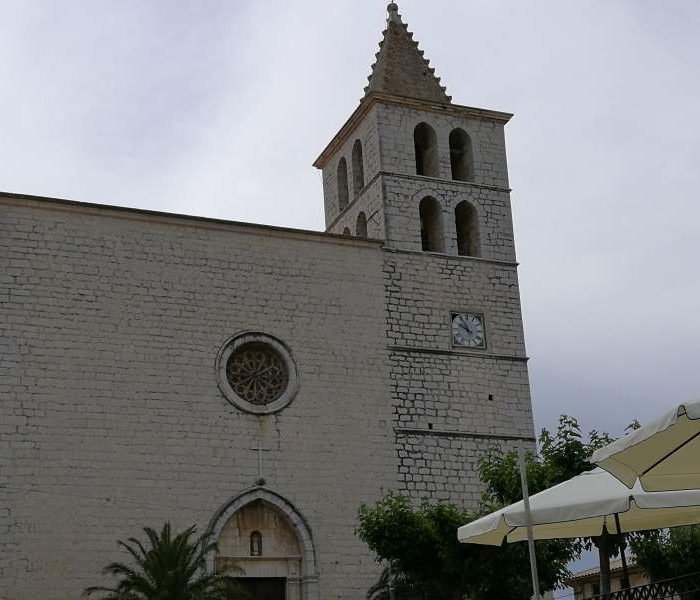 Front facade of church of Sant Miquel in Campanet village center, Mallorca.