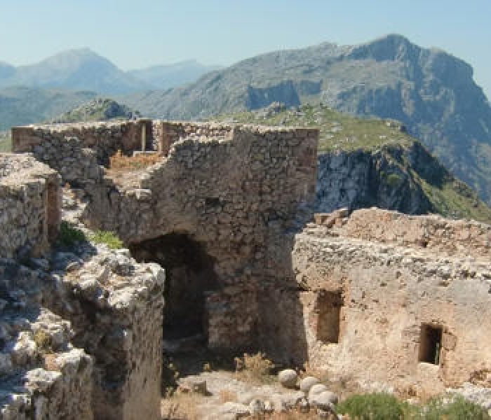 Ruins of ancient fortress of Castell del Rei on a mountain ridge in the Tramuntana mountain range, Mallorca island.