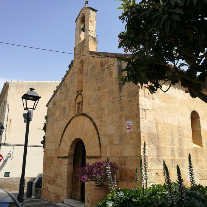 Cute chapel and old alm house of Capella de la Sang in Muro village, Mallorca.