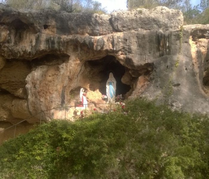 Small chapel built into the rocky walls of Cueva de Lourdes in Santa Eugenia, Mallorca island.
