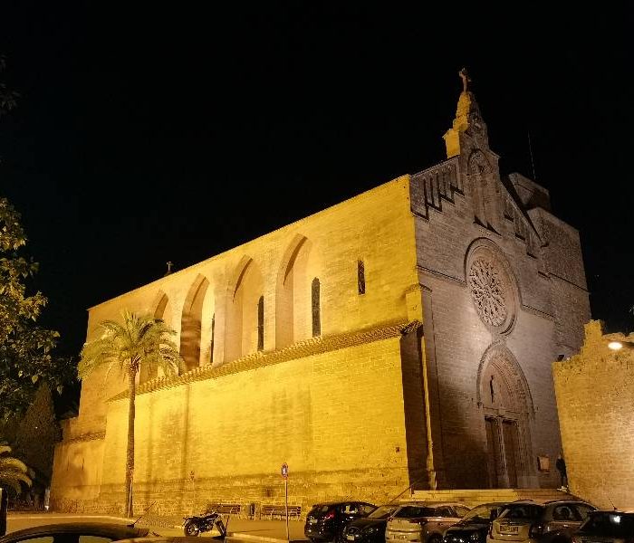 Sant Jaume church in Alcudia, Mallorca illuminated at night.