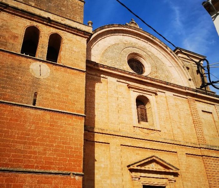 Facade and main entrance of the Sant Julia church in Campos, Mallorca.