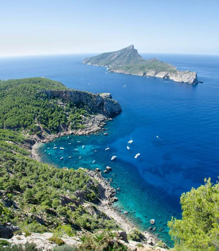 Coastal view of Illa de sa Dragonera island, shaped like a dragon's back, off of the coast of Mallorca, Spain.