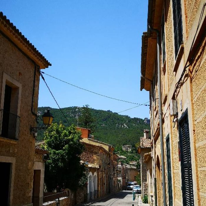 Houses with typical architecture of the Tramuntana mountains in the village of Esporles, Mallorca island.
