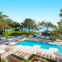 hotel-playa-muro-village-mallorca-spain-swimming-pool-sunny-beachfront