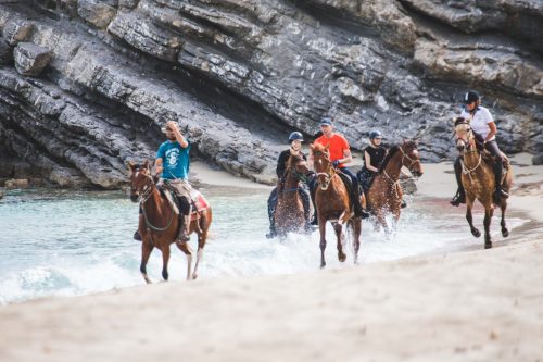 Horseback riding on a beach in Mallorca.