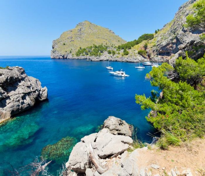 Picturesque cove of Port de Calobra by the coast of Tramuntana mountains in Mallorca.