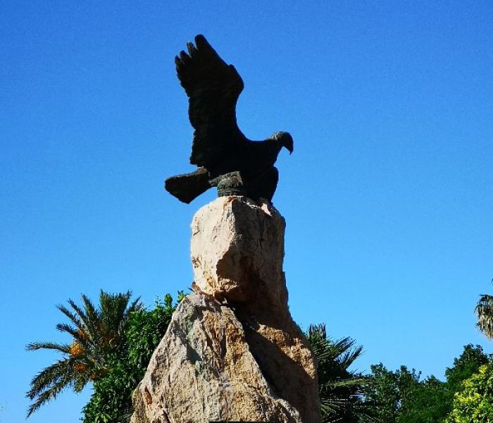 Sculpture of an eagle on the town square of Placa Carles V in Alcudia, Mallorca.