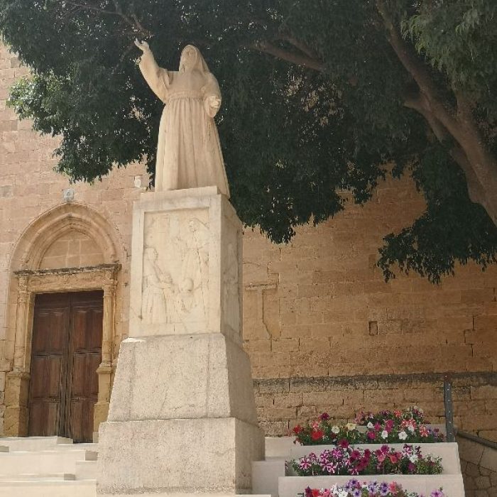 Statue of sister Francinaina Cirer on a monument in front of the parish church in Sencelles village, Mallorca.