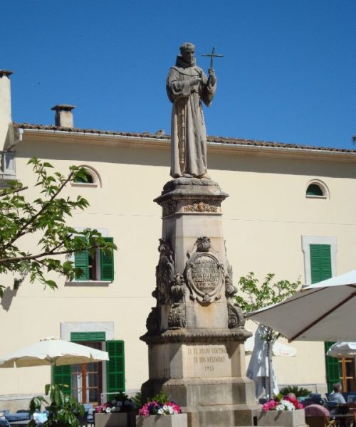 Big statue of preacher Father Junipero Serra on a aquare in Petra village, Mallorca, Spain.