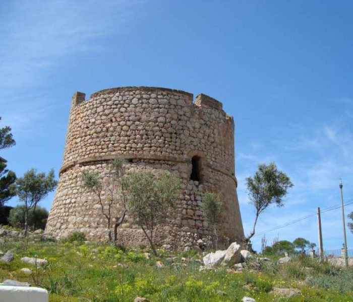 Old coastal watchtower of Sa Mola or Sant Carles on the cliffs above Port de Andratx, Mallorca.